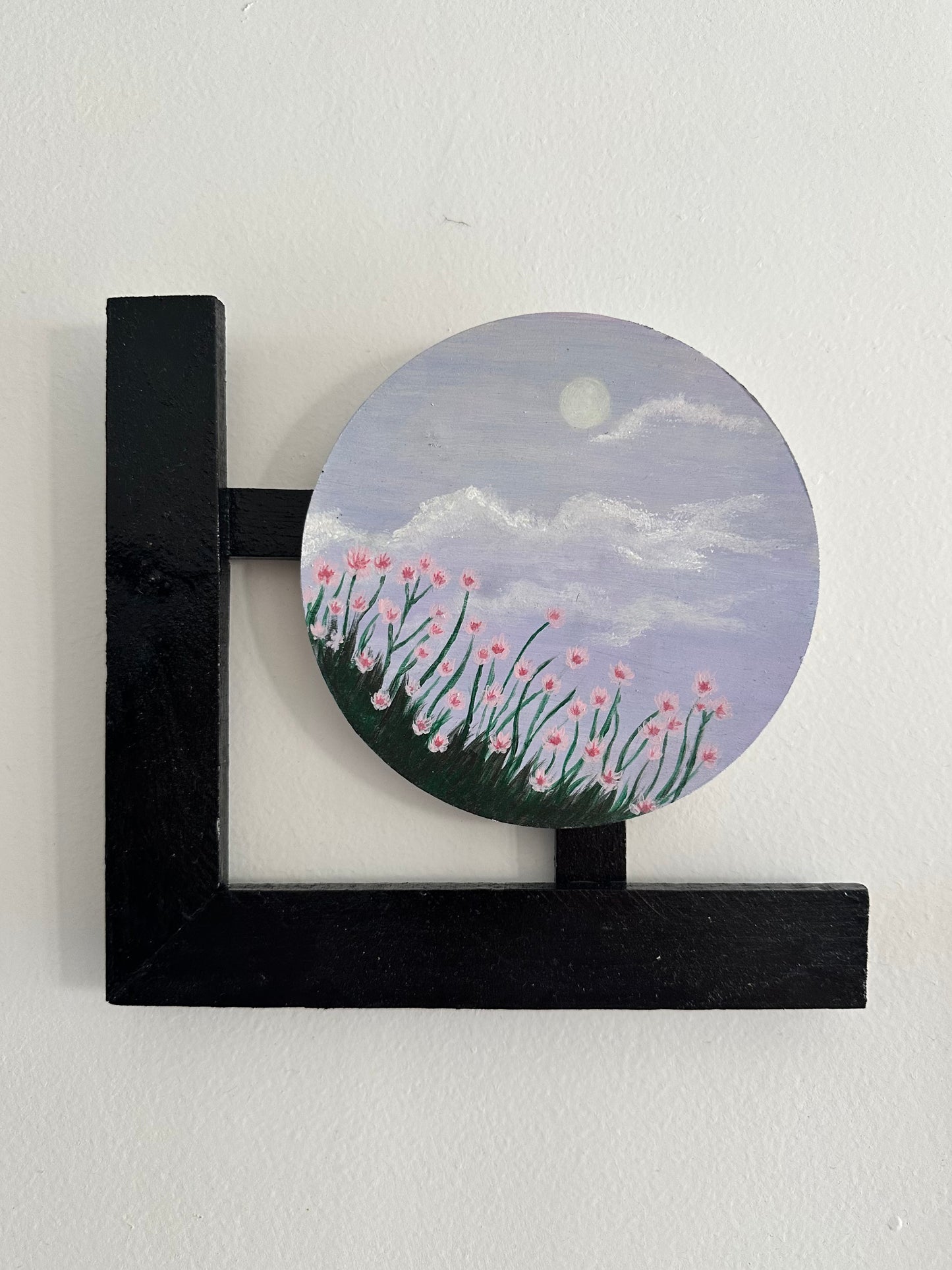 Wall hangings - set of 3 | Round Floral paintings with L-shaped black wooden frames.