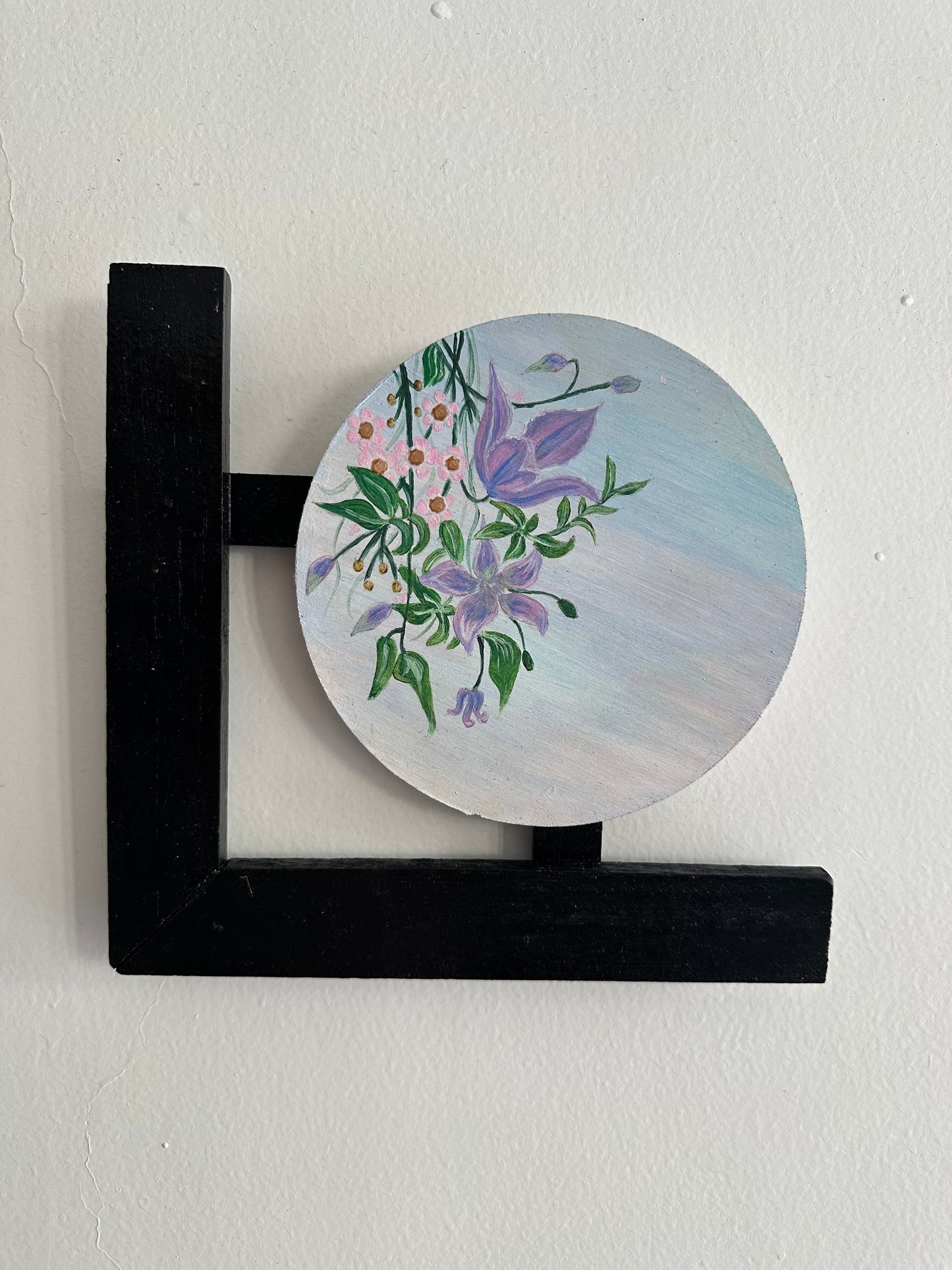 Wall hangings - set of 3 | Round Floral paintings with L-shaped black wooden frames.